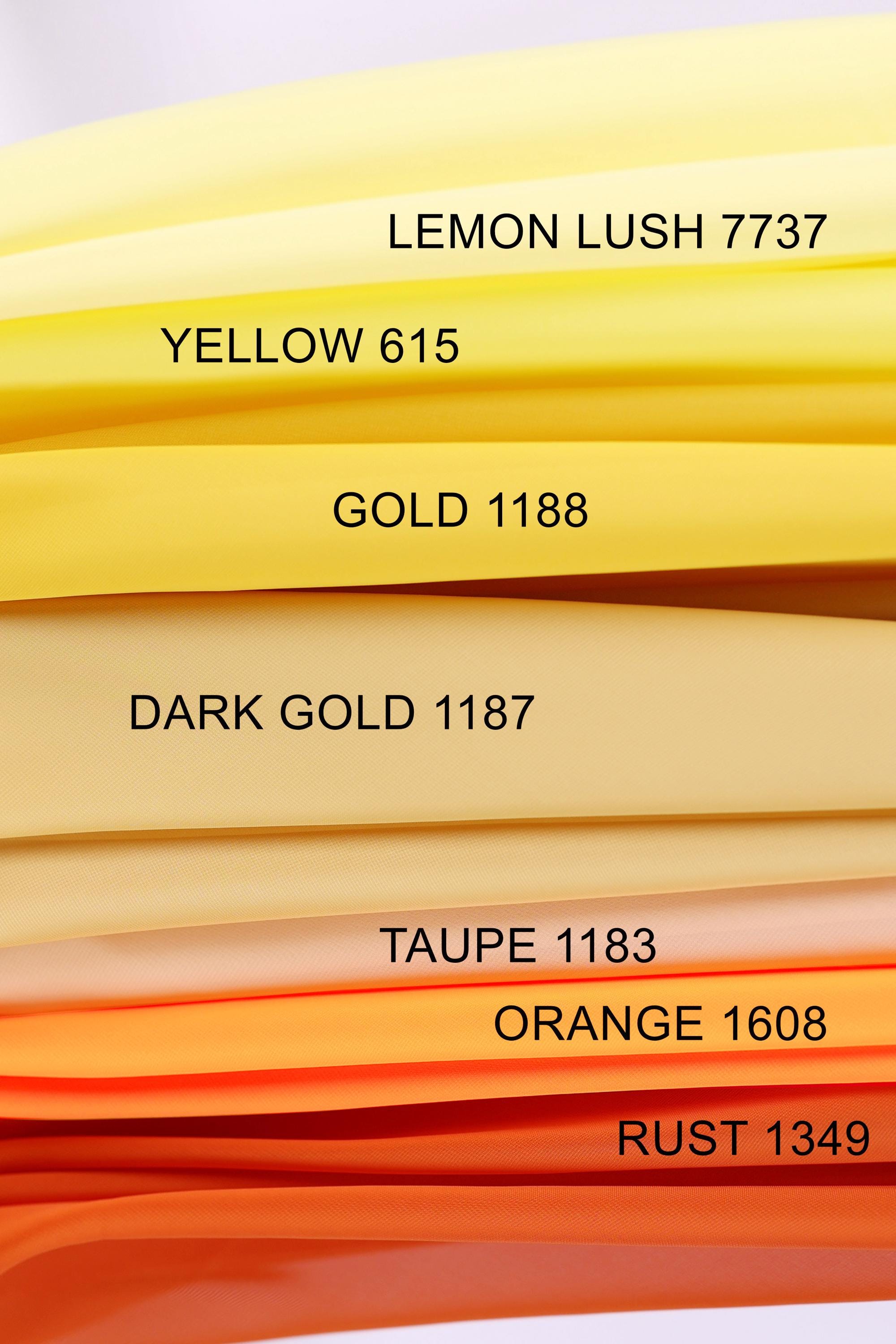 a collection of fabric swatches in various colors, including yellow, orange, and dark gold.