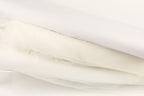 The image is a close-up of a white fabric, possibly a sheer or sheer-like material, with a slightly crumpled appearance.