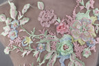 a close up of a dress with flowers on it