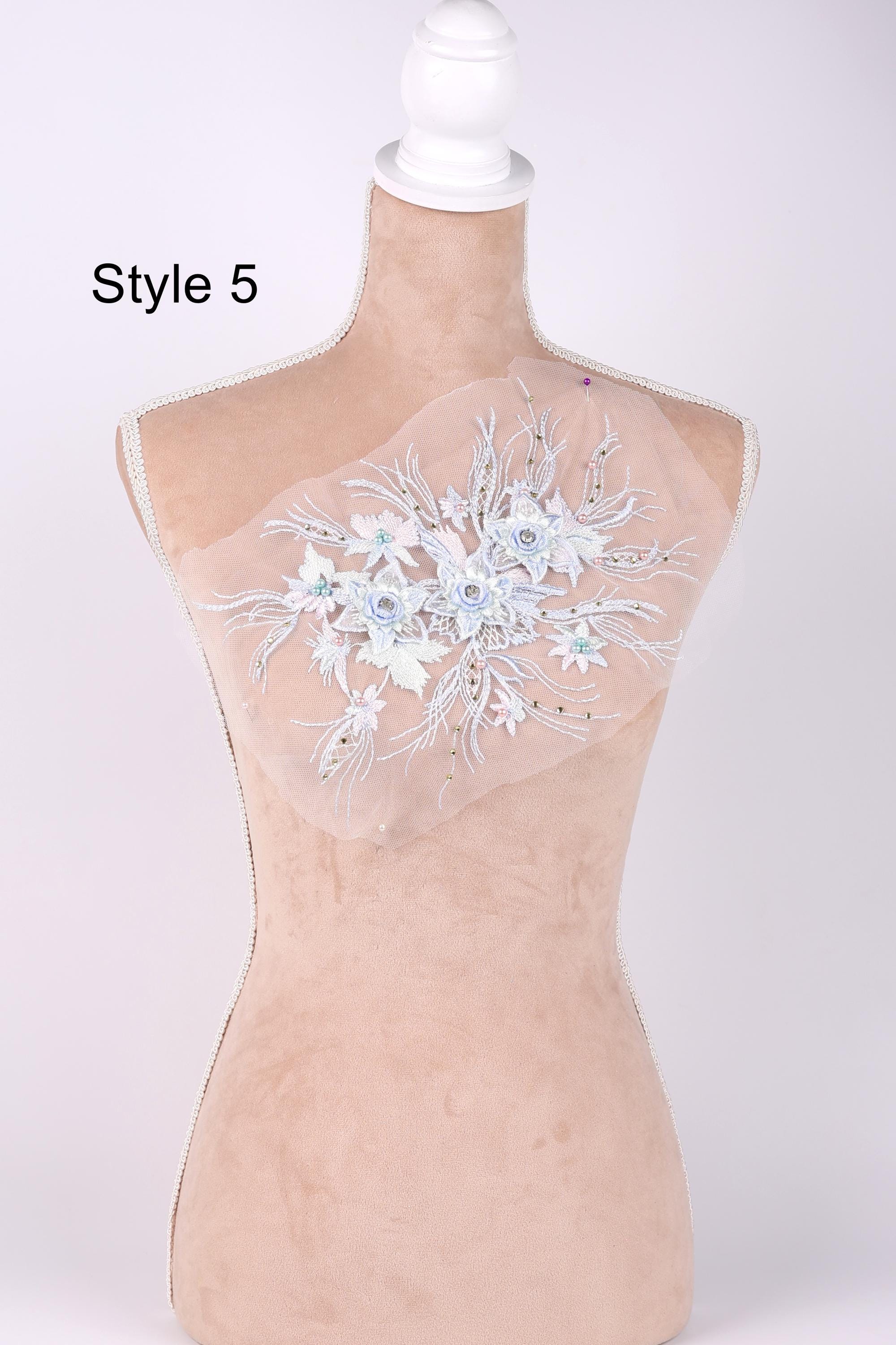 A mannequin with a floral embroidered patch on its bust, labeled as "Style 5".