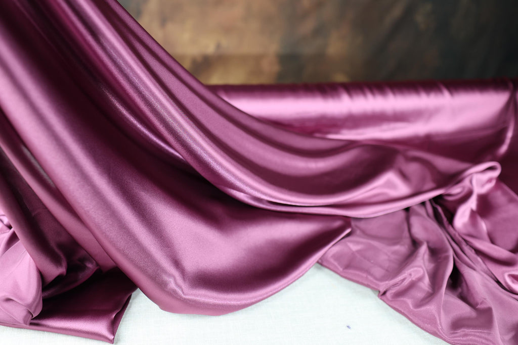 a close up of a purple satin fabric
