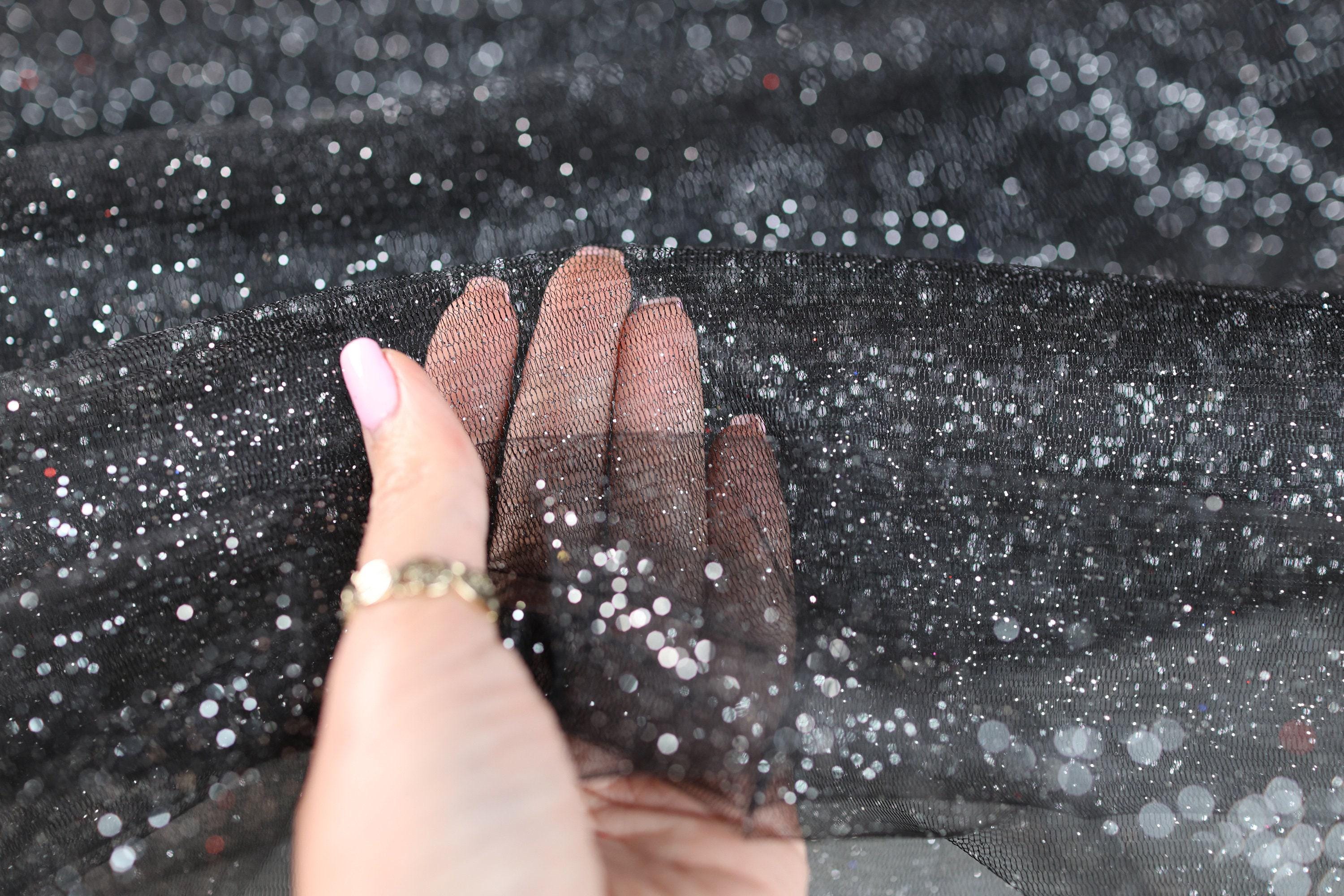 a woman's hand is touching the windshield of a car