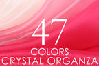 The image is a close-up of a fabric with the number "47" and the words "COLORS CRYSTAL ORGANZA" displayed prominently.