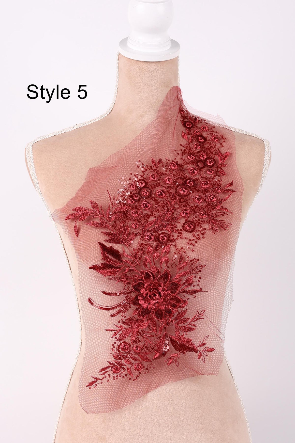 A mannequin wearing a red floral embroidered dress, with the text "Style 5" indicating the style of the dress.