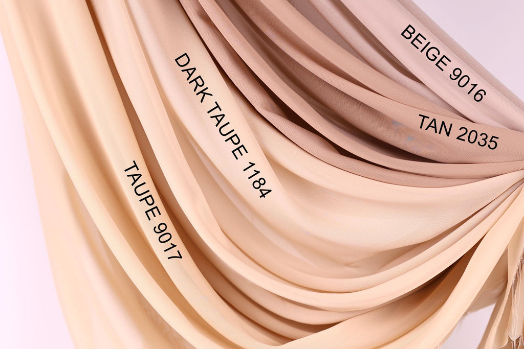 a collection of fabric swatches in various shades of beige, ranging from light to dark. The swatches are arranged in a way that allows for easy comparison and identification of the different colors.