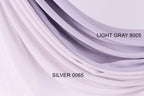 a close-up view of a fabric with a gradient of light and dark purple colors. The fabric appears to be made of a soft, flowing material, possibly silk or chiffon. The image is labeled with the text "LIGHT GRAY 8005" and "SILVER 0065" to identify the specific fabric color and material.