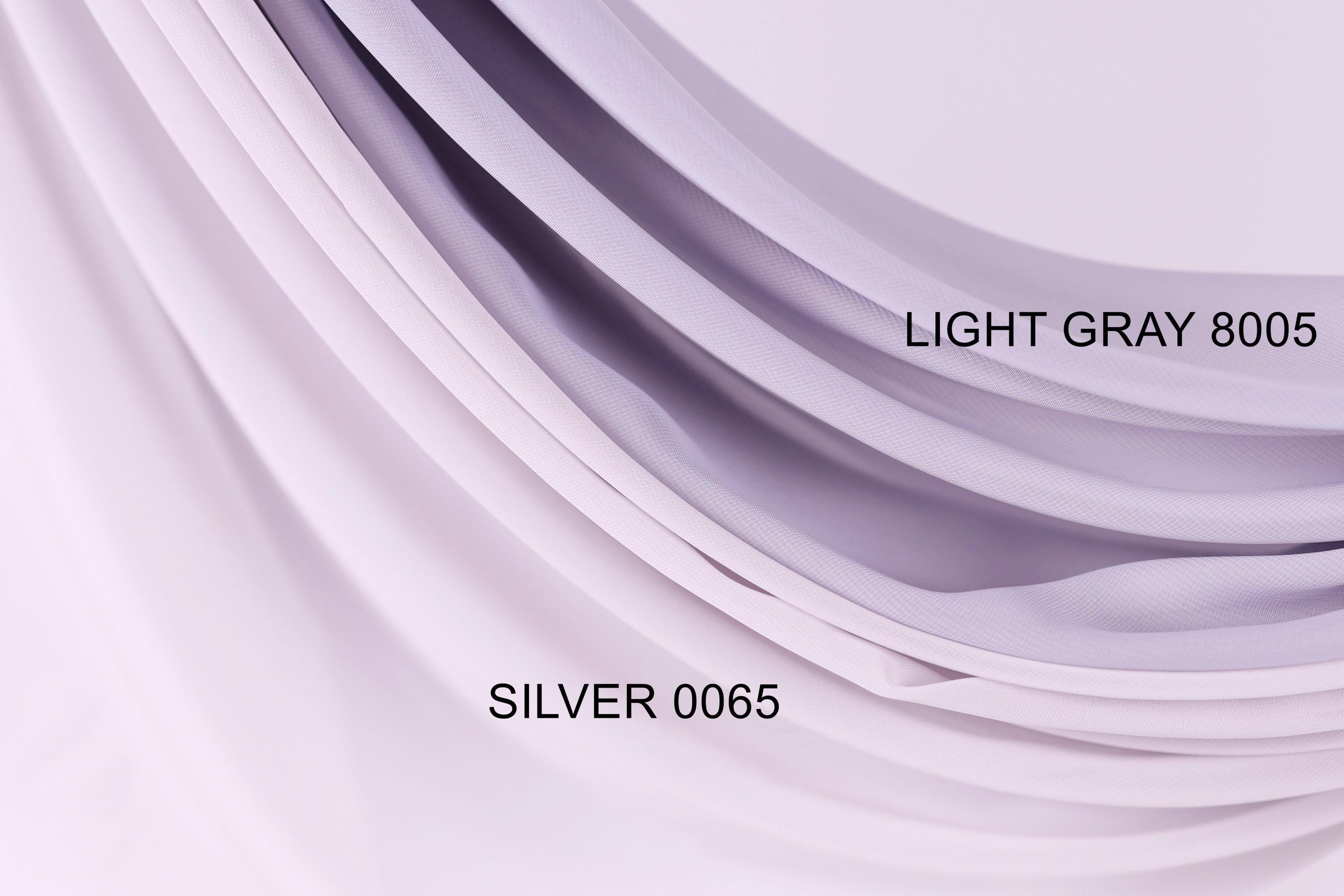 a close-up view of a fabric with a gradient of light and dark purple colors. The fabric appears to be made of a soft, flowing material, possibly silk or chiffon. The image is labeled with the text "LIGHT GRAY 8005" and "SILVER 0065" to identify the specific fabric color and material.