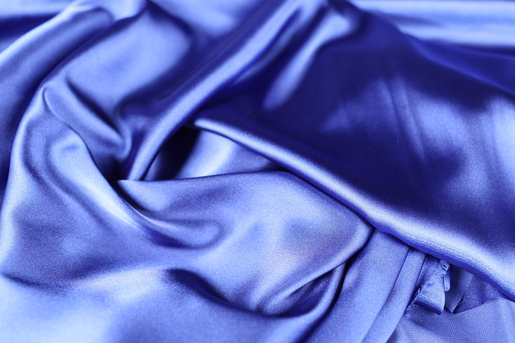 a close up of a blue silk fabric
