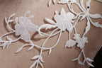 a close up of a piece of cloth with flowers on it