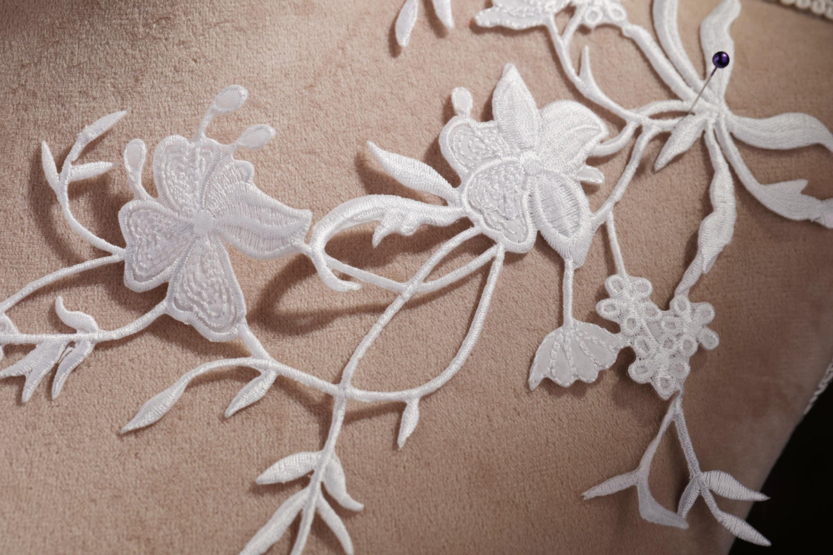 a close up of a piece of cloth with flowers on it