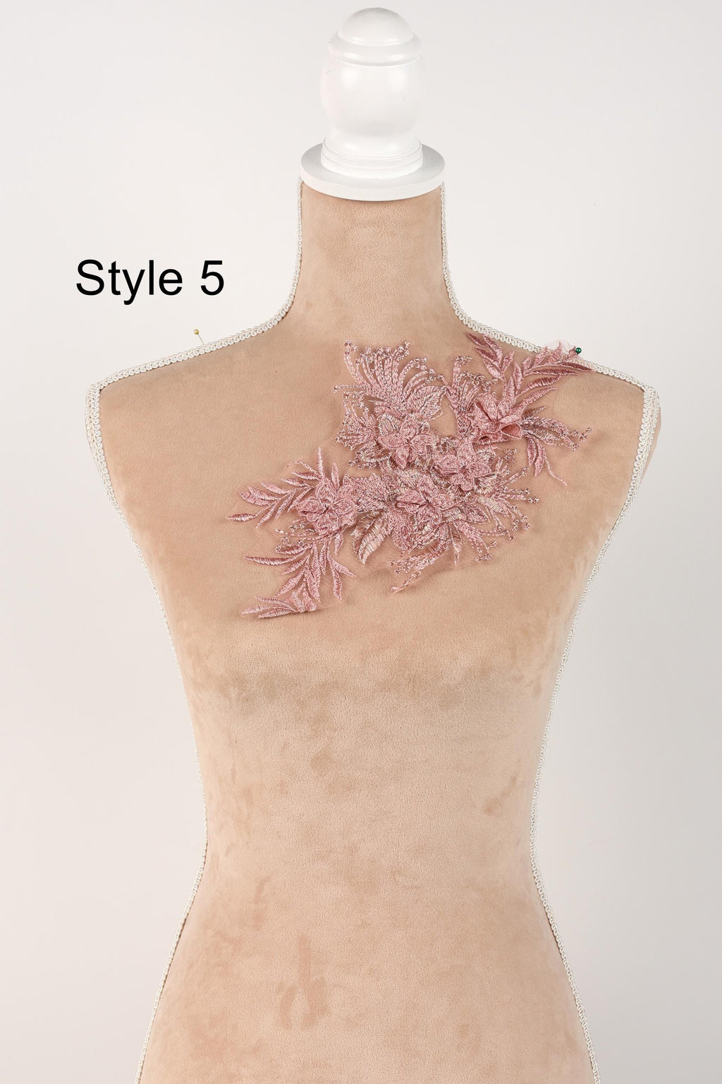 A mannequin with a pink floral embroidered on its shoulder, labeled as "Style 5".