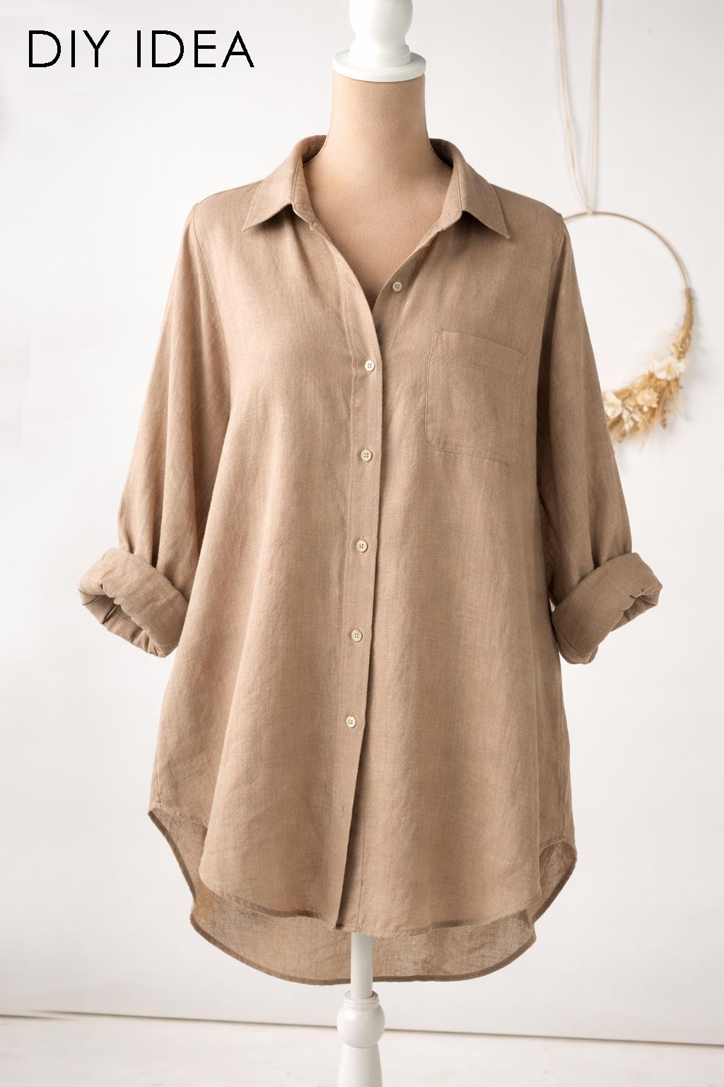 A mannequin wearing a beige button-up shirt with rolled sleeves, displayed against a white background.