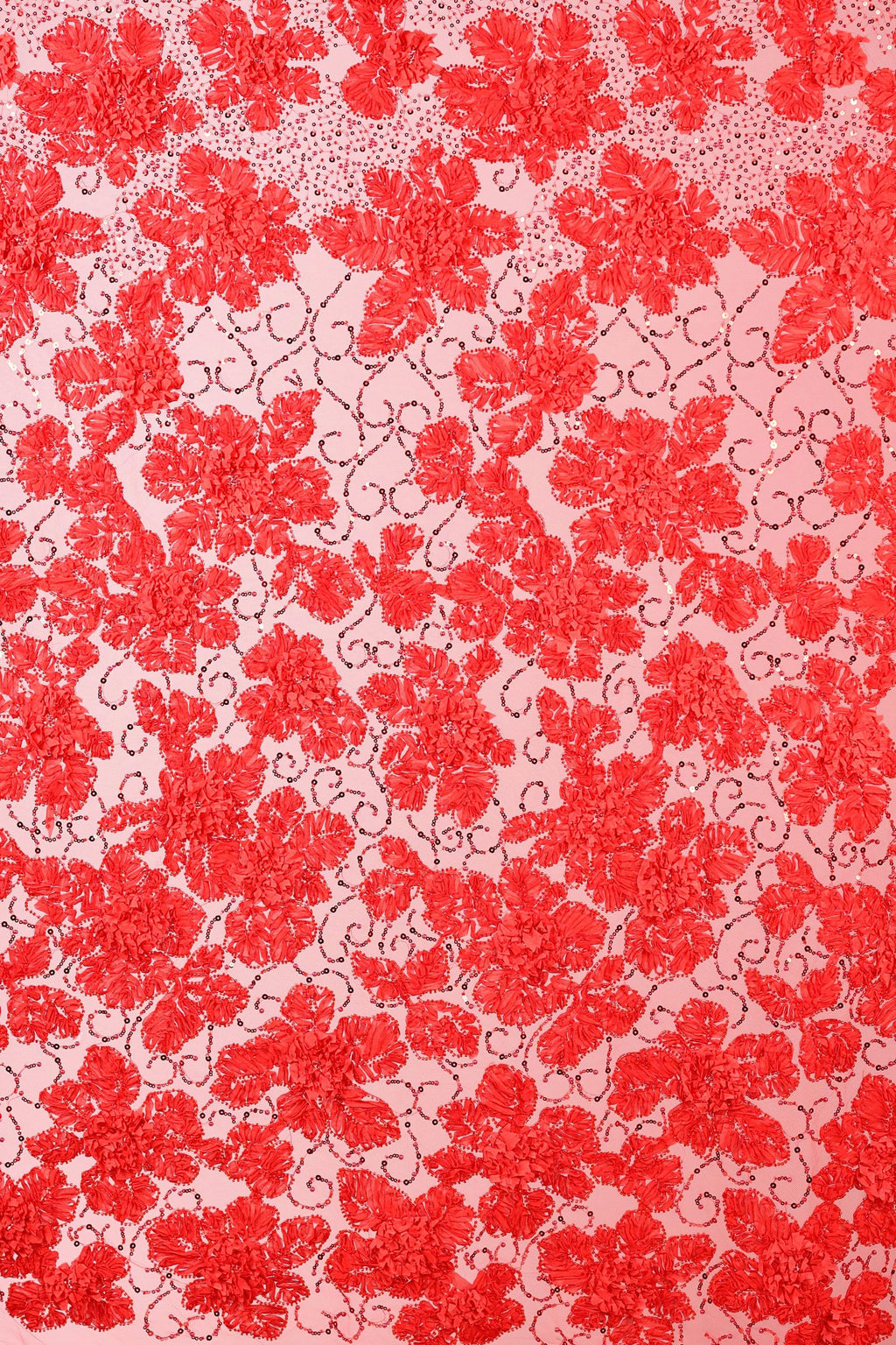 a vibrant red floral pattern with numerous red flowers and leaves scattered across a light pink background.