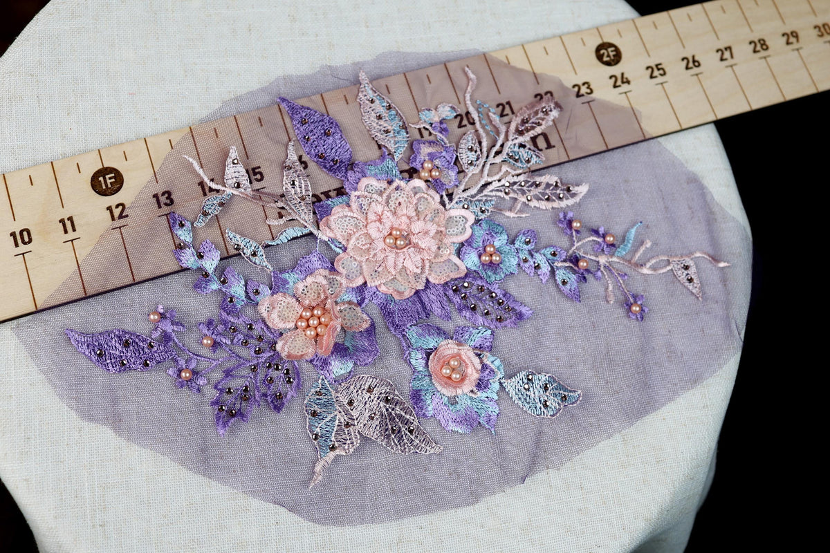a close up of a piece of cloth with flowers on it
