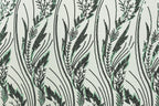 a repeating pattern of stylized green and black lines and shapes, creating a visually striking and intricate design.