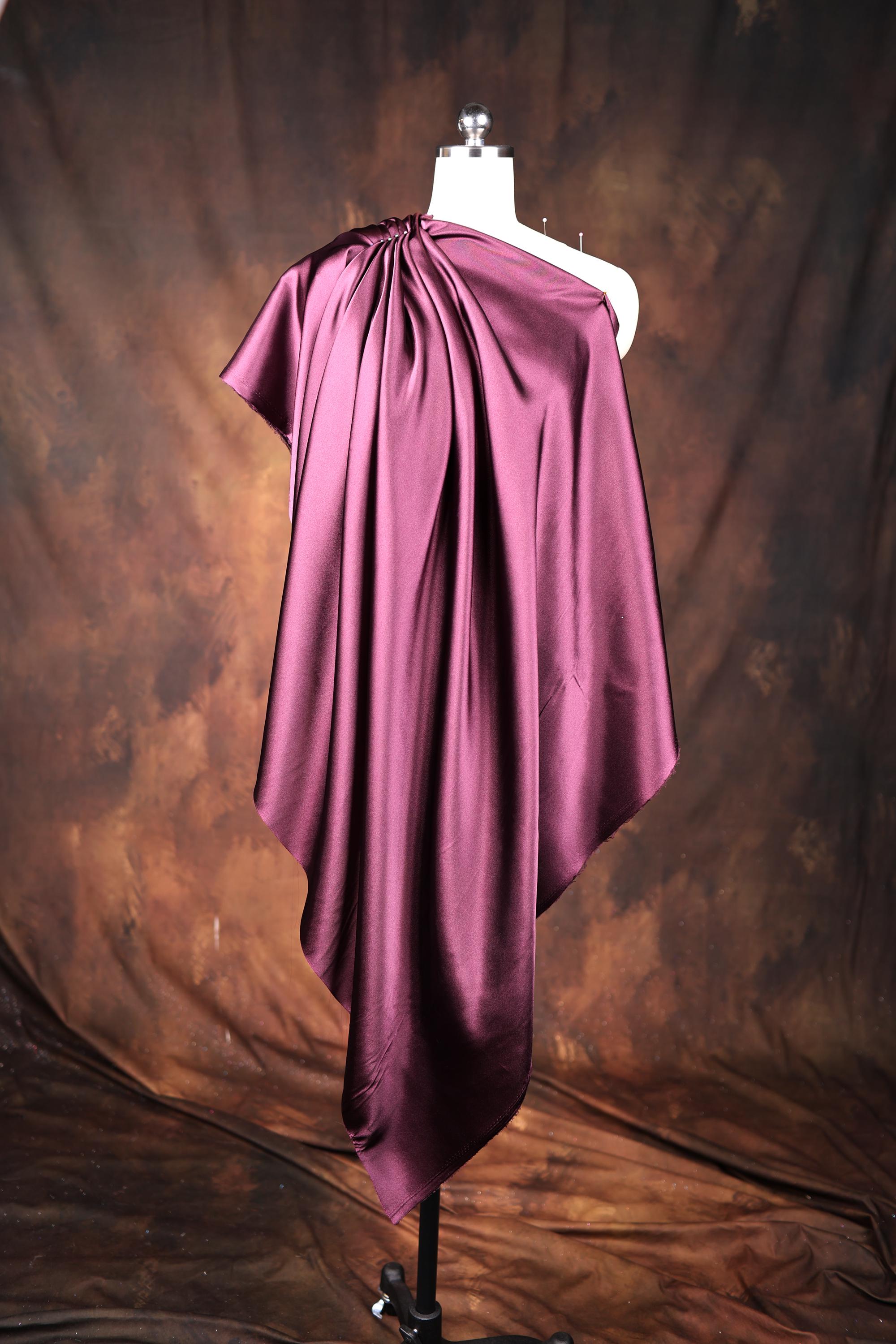 a dress on a mannequin on a brown background