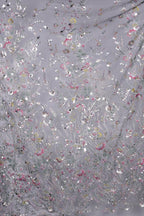 The image is a collage of various images, each featuring a different floral pattern. The patterns are predominantly white and gray, with some accents of pink and green. The overall composition creates a visually appealing and intricate design.
