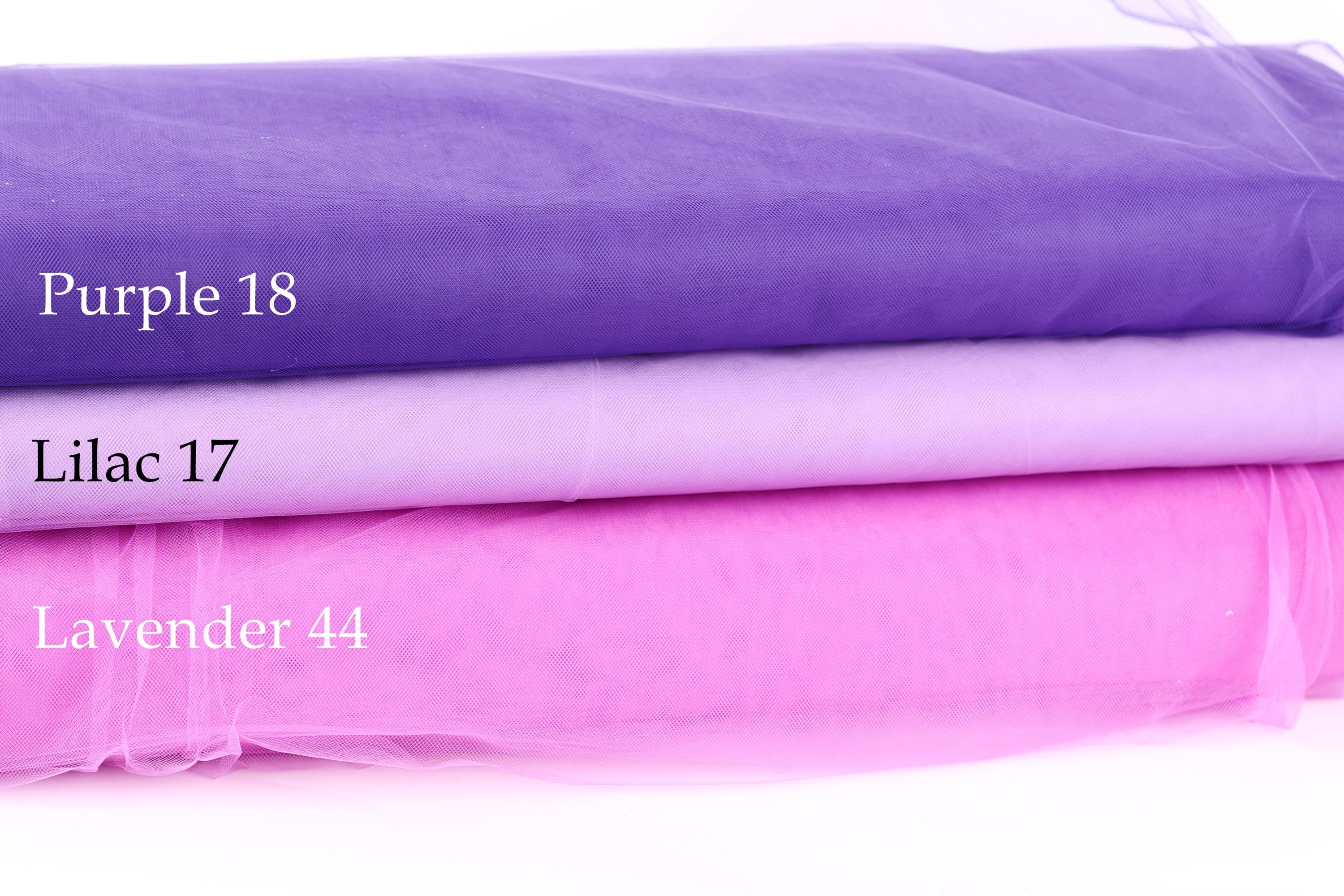 three fabric swatches stacked on top of each other, each with a different color: Purple 18, Lilac 17, and Lavender 44.