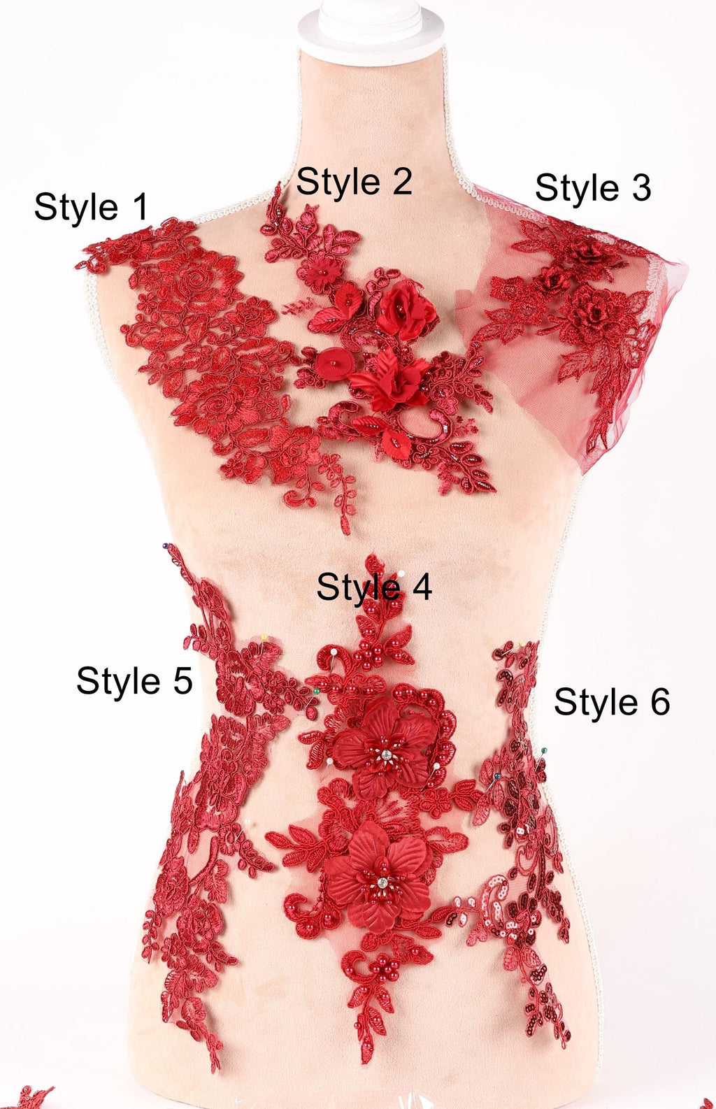 A mannequin with red floral and lace details on its body, displayed in different styles.