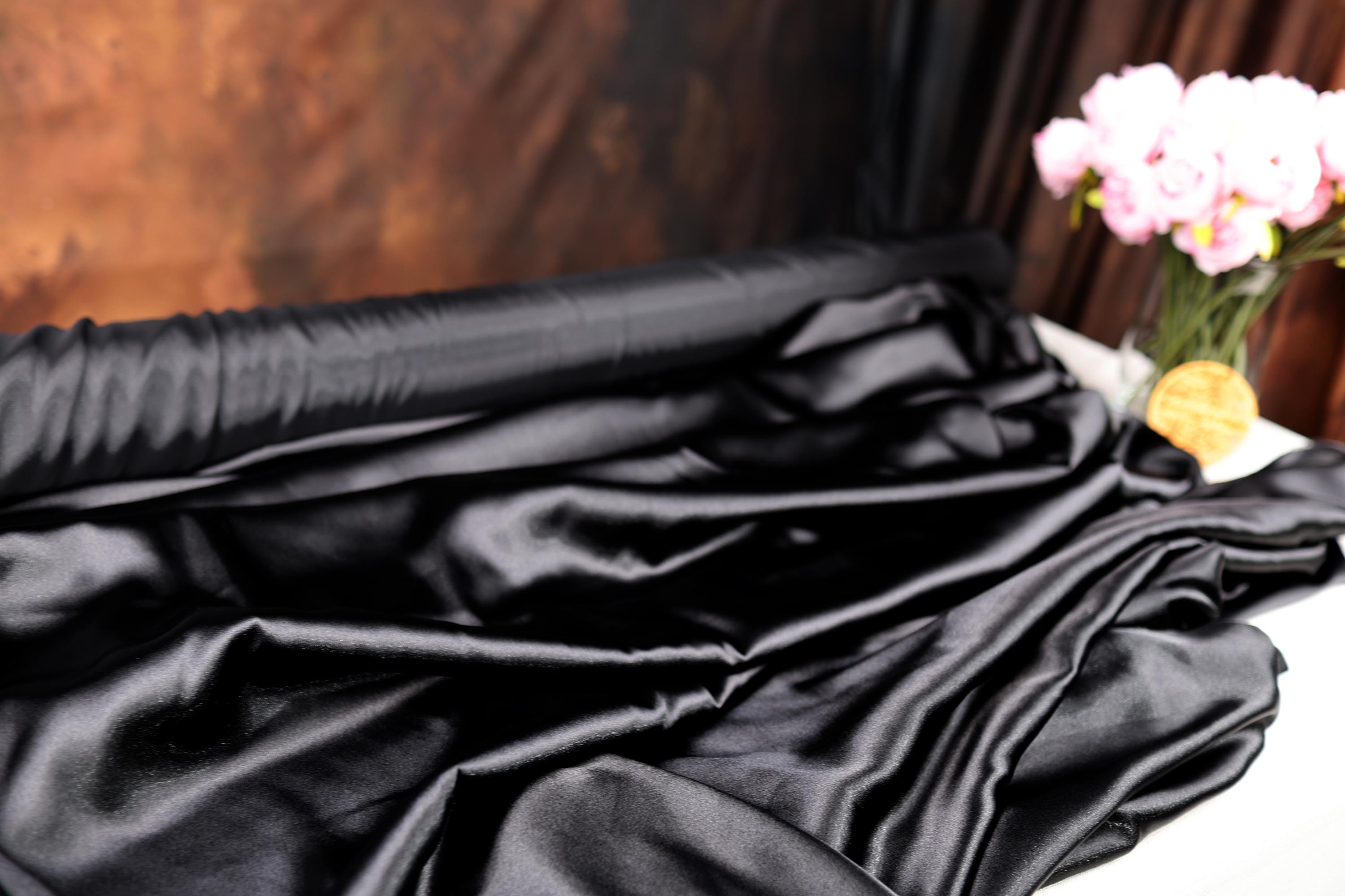 a vase filled with flowers sitting on top of a table