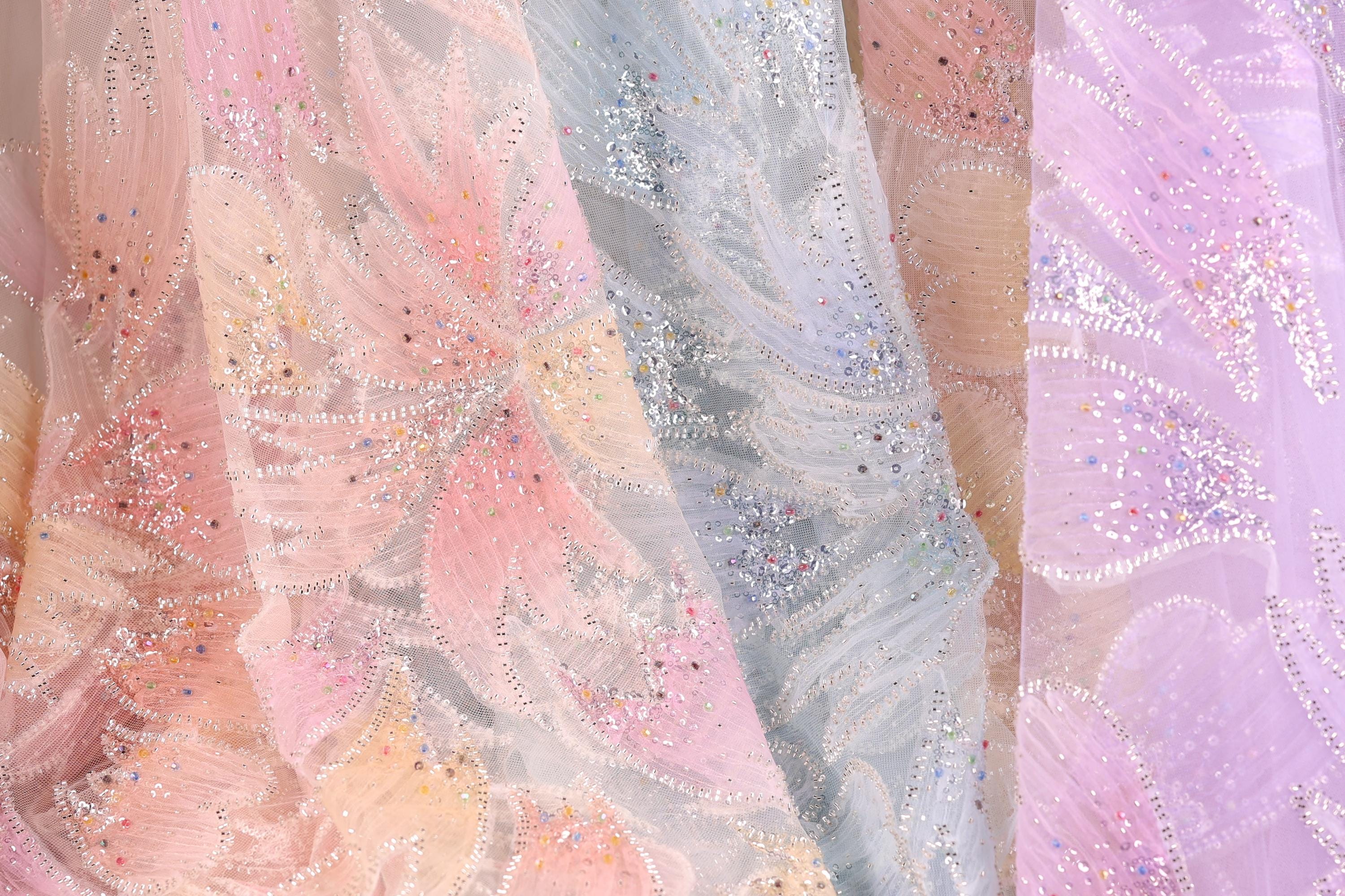 a close-up view of a fabric with a floral pattern, showcasing the intricate details and textures of the material.