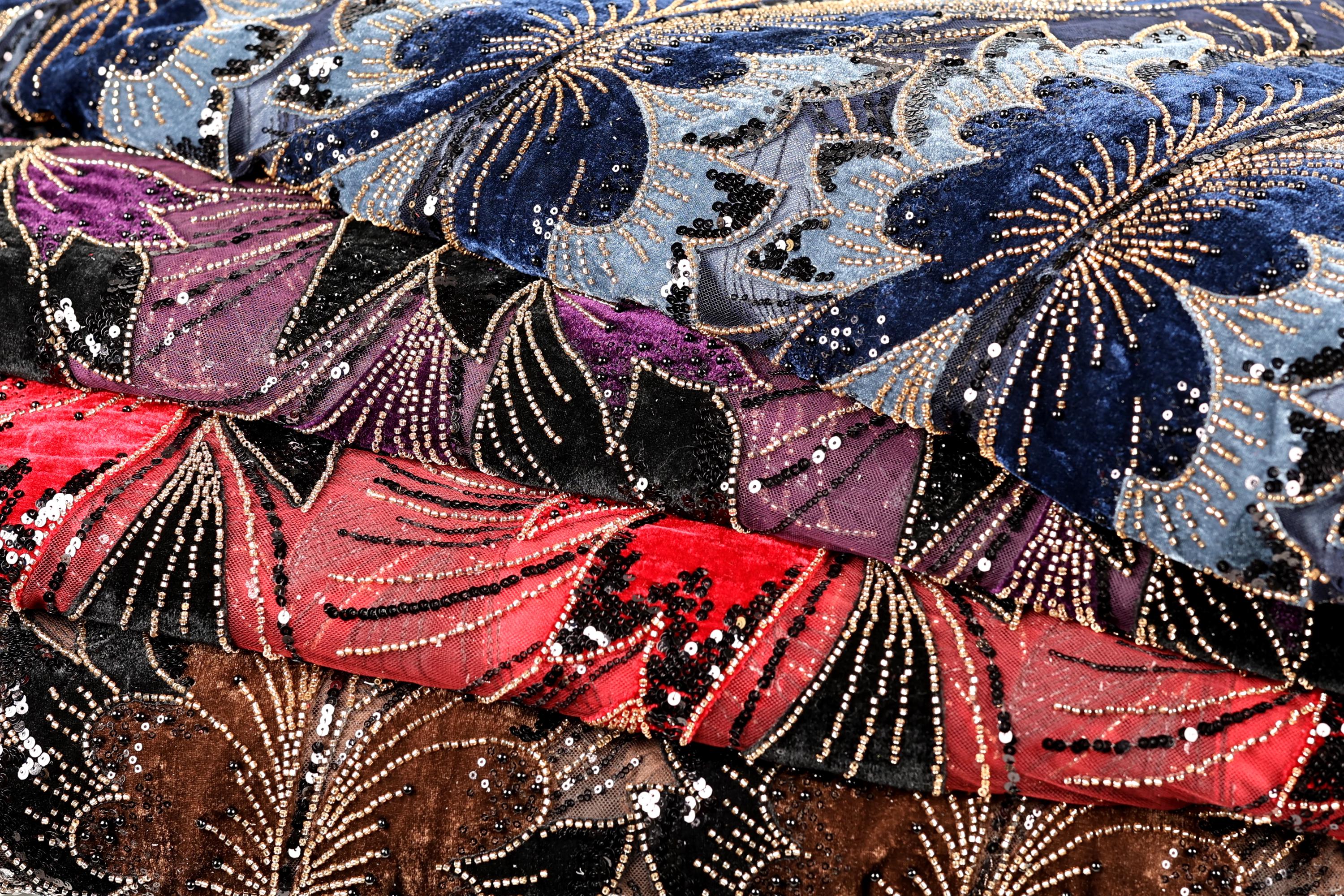 a close-up view of a fabric with a floral pattern, showcasing the intricate details and textures of the material.