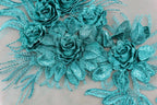 a close up of a piece of cloth with flowers on it