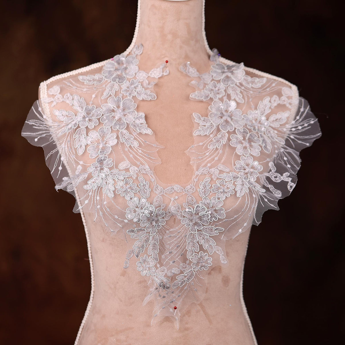 a mannequin with a white dress on it