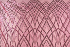 a pink background with a repeating pattern of black and pink lines and dots, creating a visually striking and intricate design.