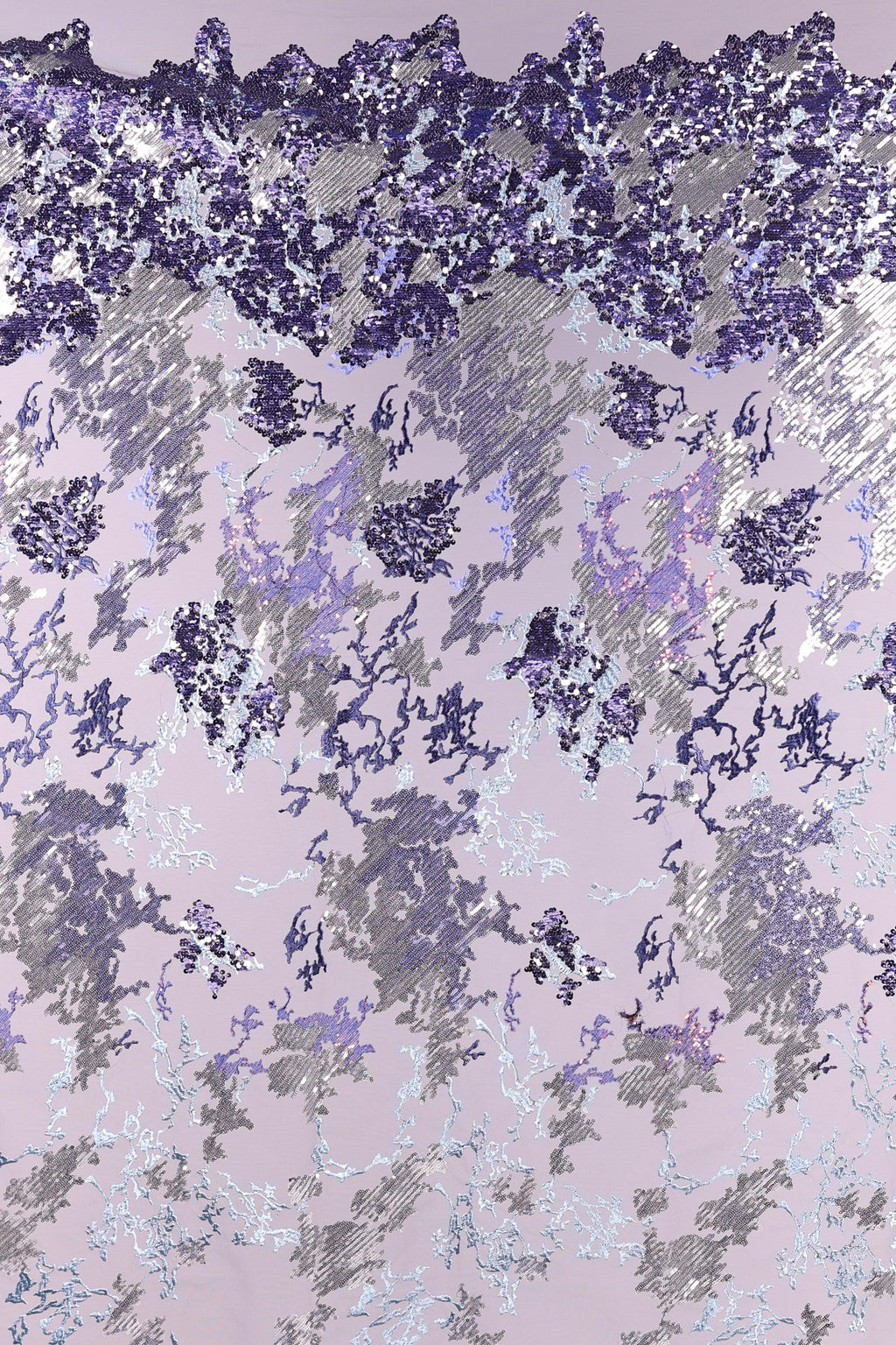 The image is a collage of various images, including a purple and gray pattern, a purple and gray pattern, and a purple and gray pattern. The collage features a mix of different textures, shapes, and colors, creating a visually interesting and dynamic composition.