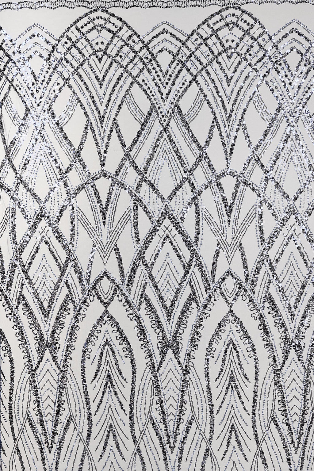 an intricate and visually striking pattern of black and white lines and shapes, creating a sense of depth and complexity. The pattern appears to be a repeating design, with the lines and shapes arranged in a way that creates a sense of movement and dynamism. The overall composition of the image is visually engaging and draws the viewer's attention to the intricate details and patterns within the design.