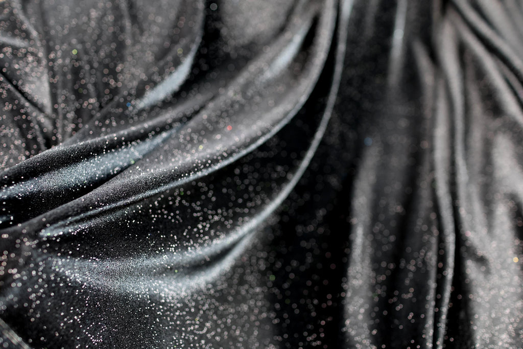 a black cloth with white speckles on it
