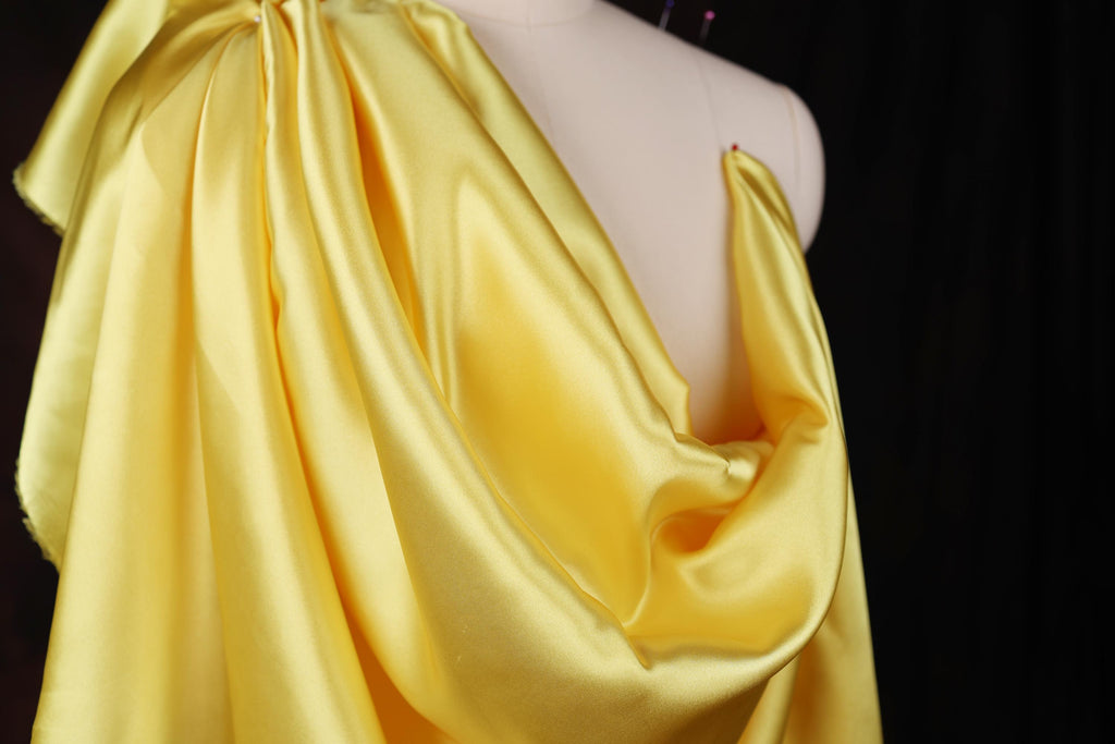 a mannequin with a yellow dress on it