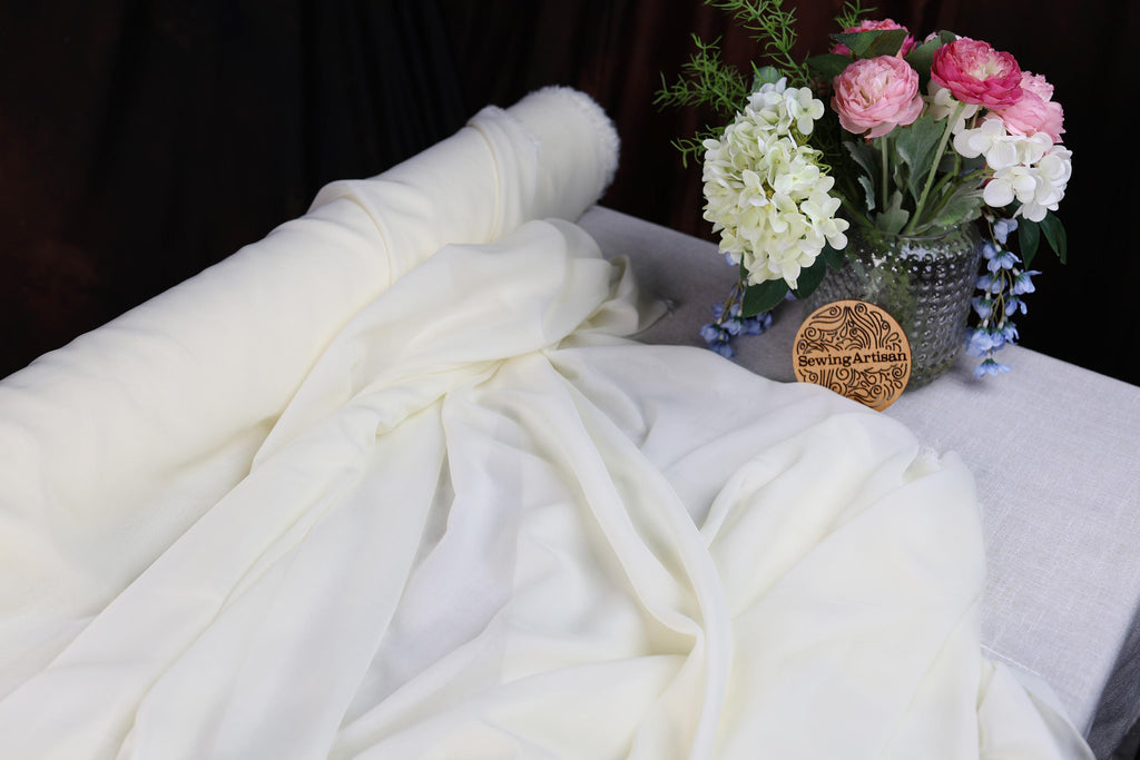 a vase of flowers sitting on top of a table