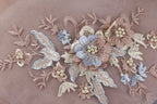 a close up of a piece of cloth with flowers on it