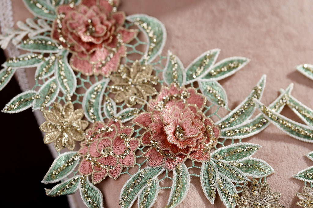 a close up of a piece of cloth with flowers on it
