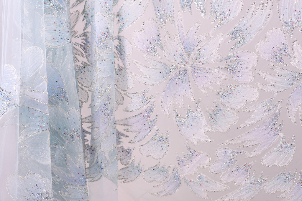 a close-up view of a fabric with a floral pattern, showcasing the intricate details and textures of the design.