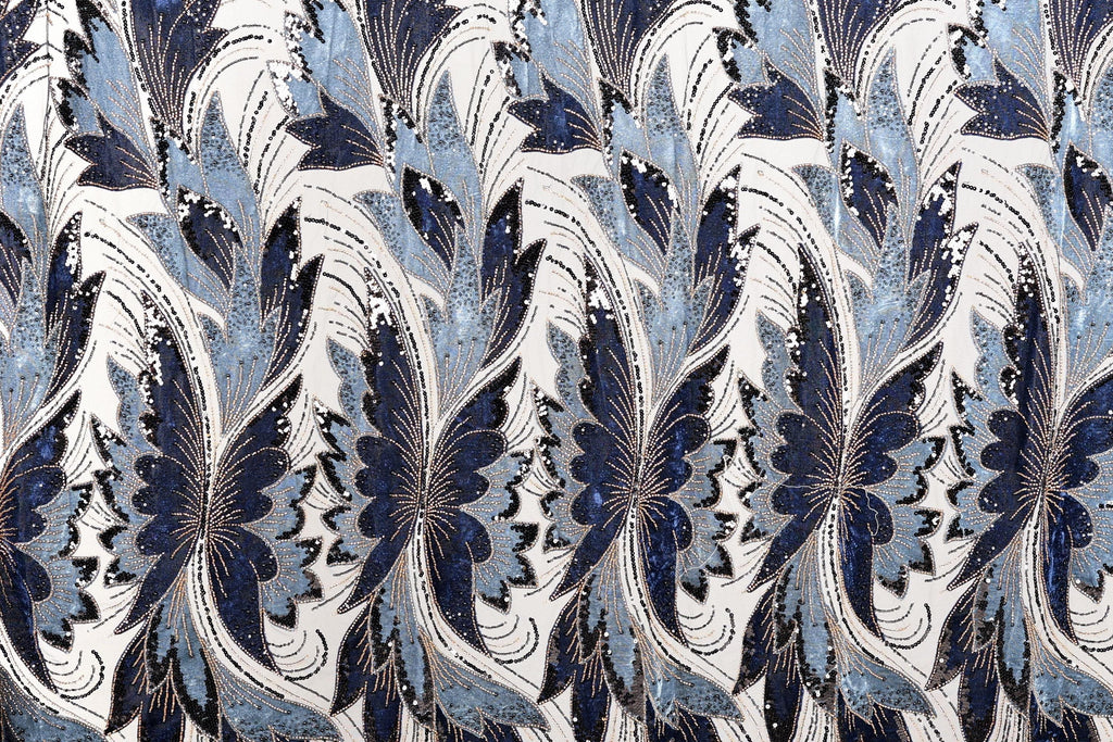 a repeating pattern of blue and white flowers or leaves, creating a visually striking and intricate design.