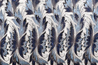 a repeating pattern of blue and white flowers or leaves, creating a visually striking and intricate design.