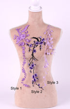 A mannequin with purple floral embroidery on its bust, displayed against a white background.