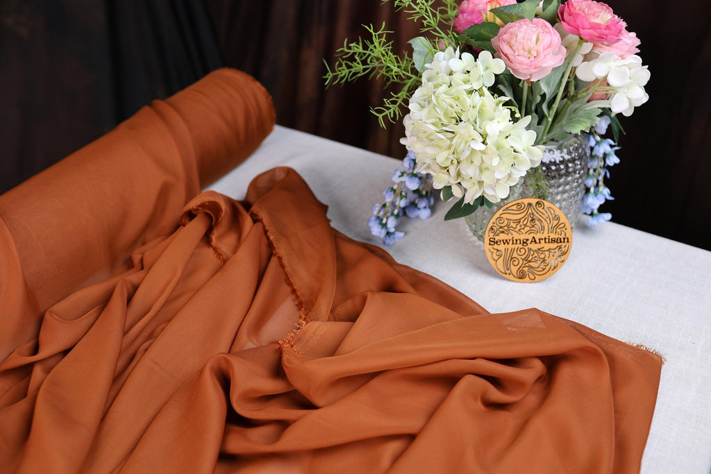 a vase of flowers sitting on top of a table