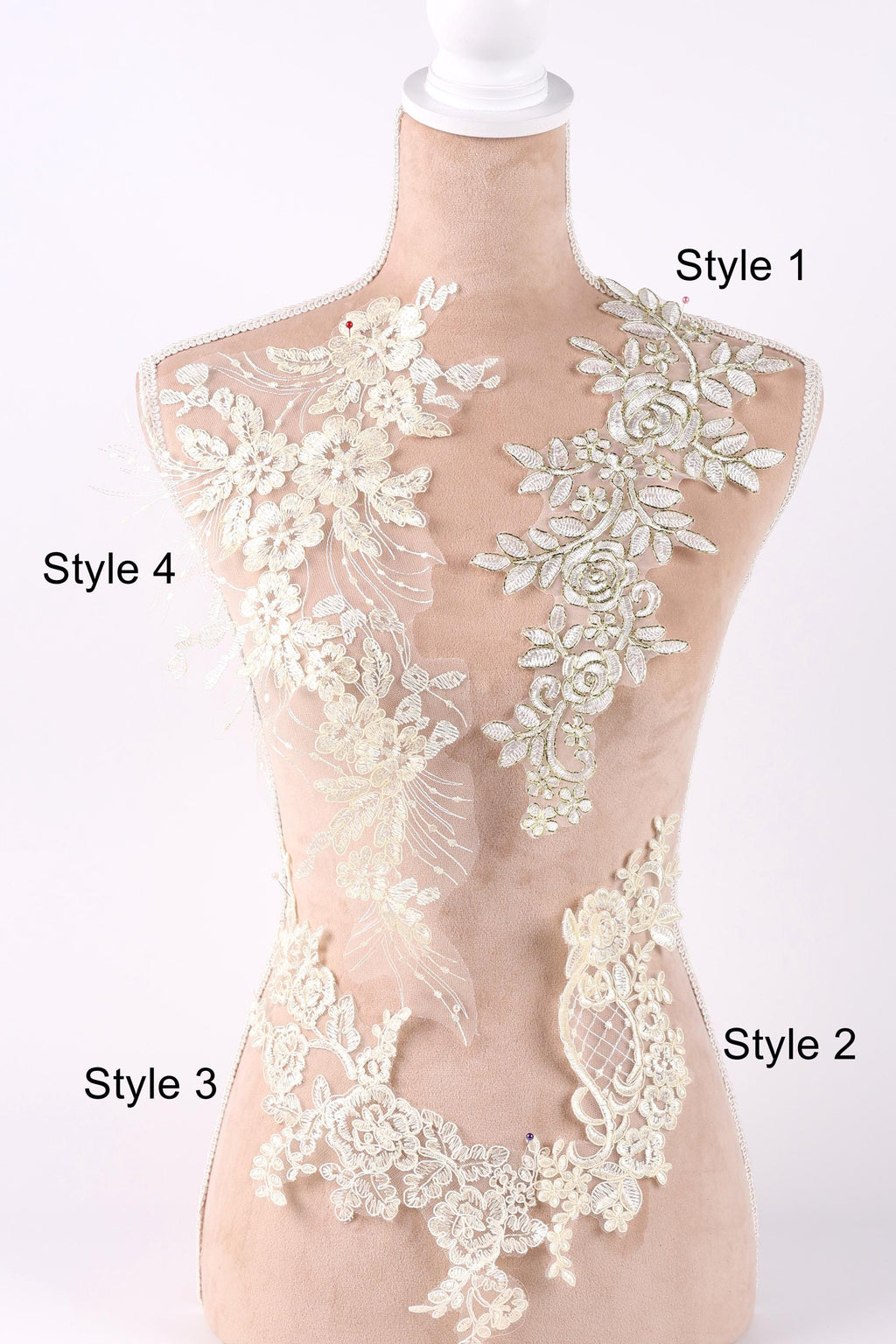 A mannequin with various styles of lace and floral embroidery displayed on its bust.
