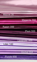 A collection of fabric swatches in various shades of purple, including Mauve 35, Magenta 592, Raisin 36, Plum 555, Lavender 468, Lilac 140, Purple 658, and Orchid 554.
