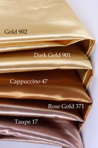 a stack of four fabric swatches, each representing a different color: Gold 902, Dark Gold 901, Cappuccino 47, and Rose Gold 371.