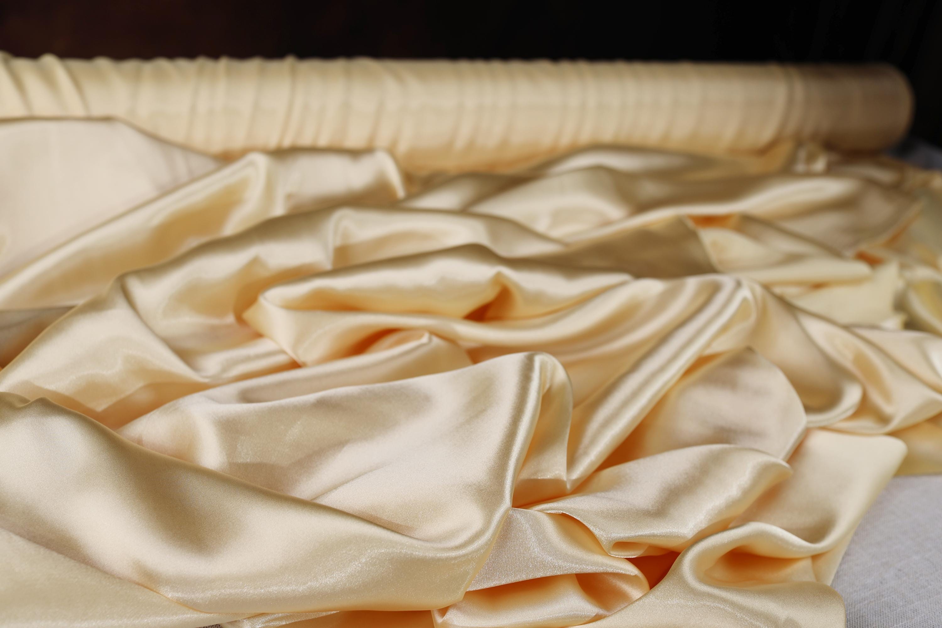 a close up of a cloth on a bed