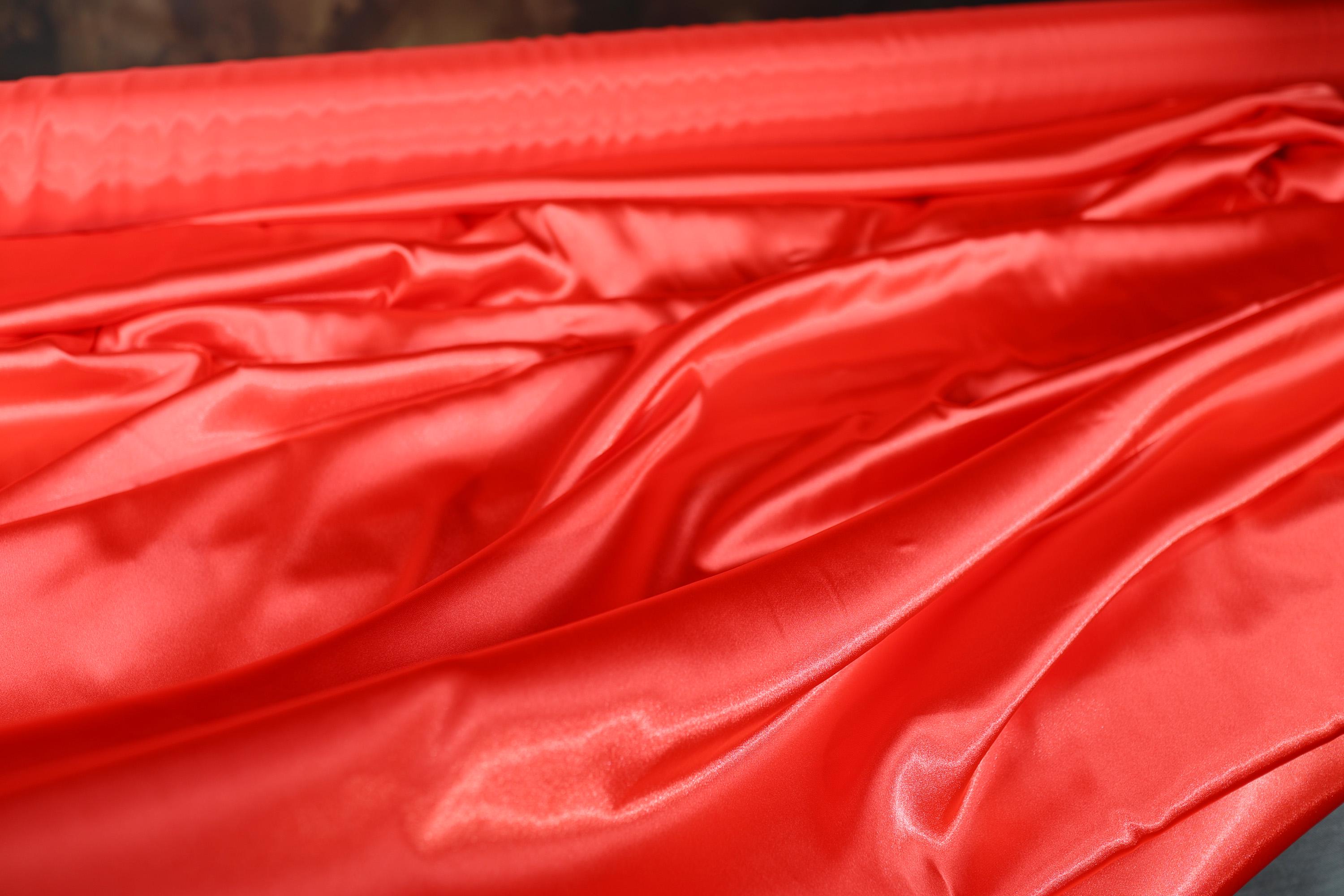 a close up of a red cloth on a table