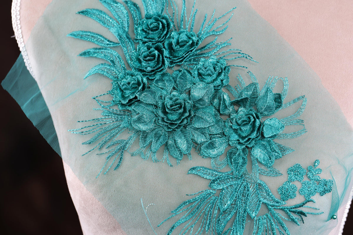 a close up of a dress with flowers on it