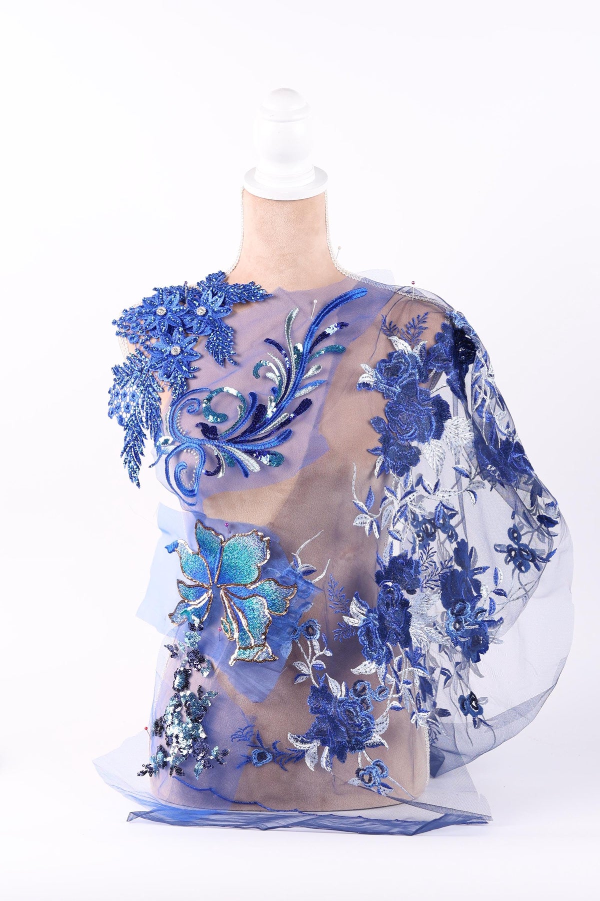 a dress with a floral pattern in shades of blue and white.