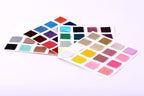 a collection of fabric swatches in various colors, including red, blue, green, and pink, arranged on a white background.