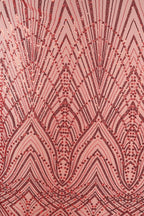 a close-up view of a fabric with a repeating pattern of red and black lines and dots, creating a visually striking and intricate design.
